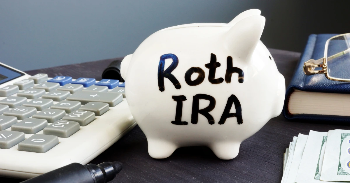 Roth IRA for kids piggy bank with calculator for retirement savings planning